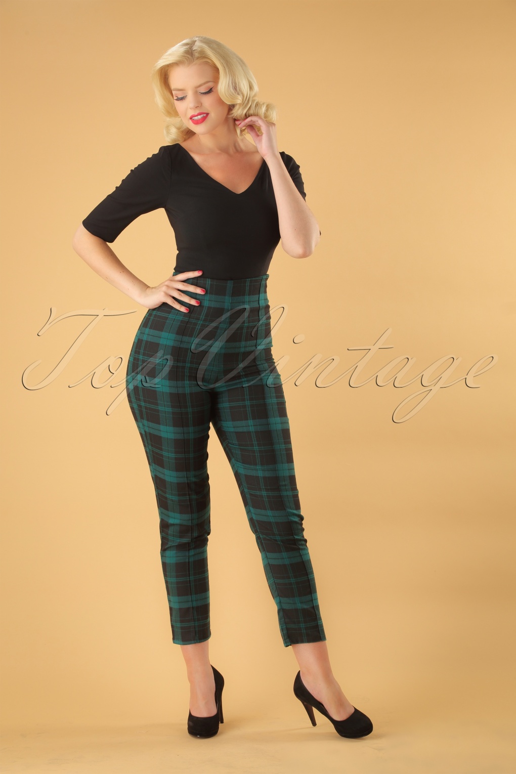 green and black check trousers
