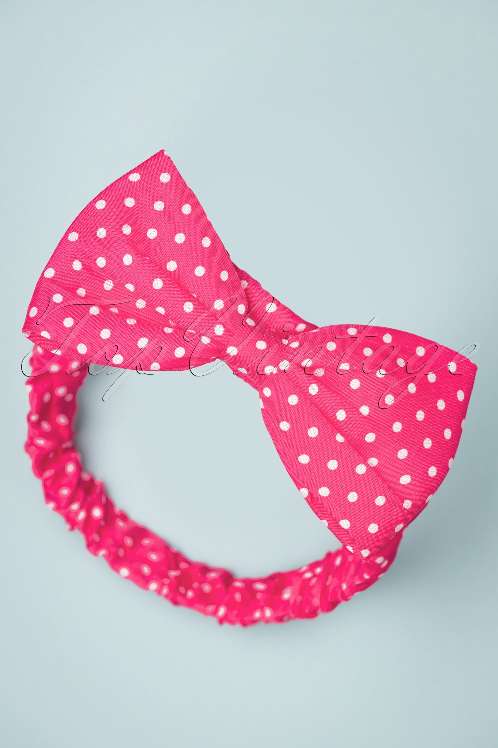 Banned Retro - Dionne Polka Dot Bow-hoofdband in donkerroze