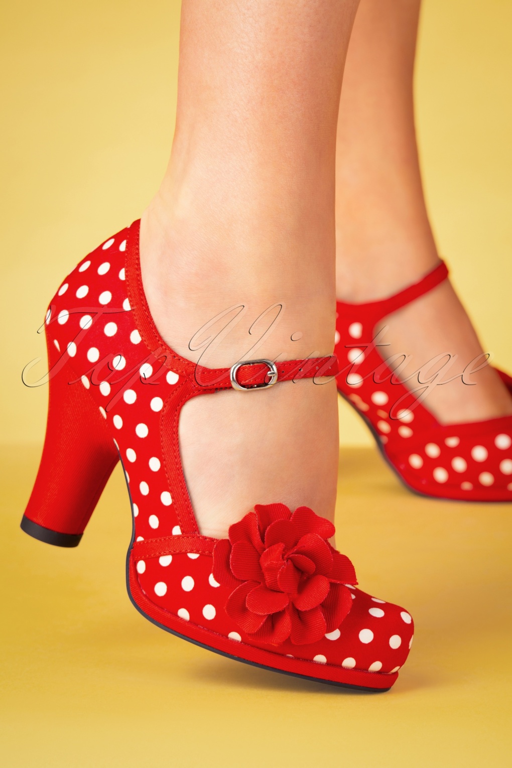 red polka dot pumps