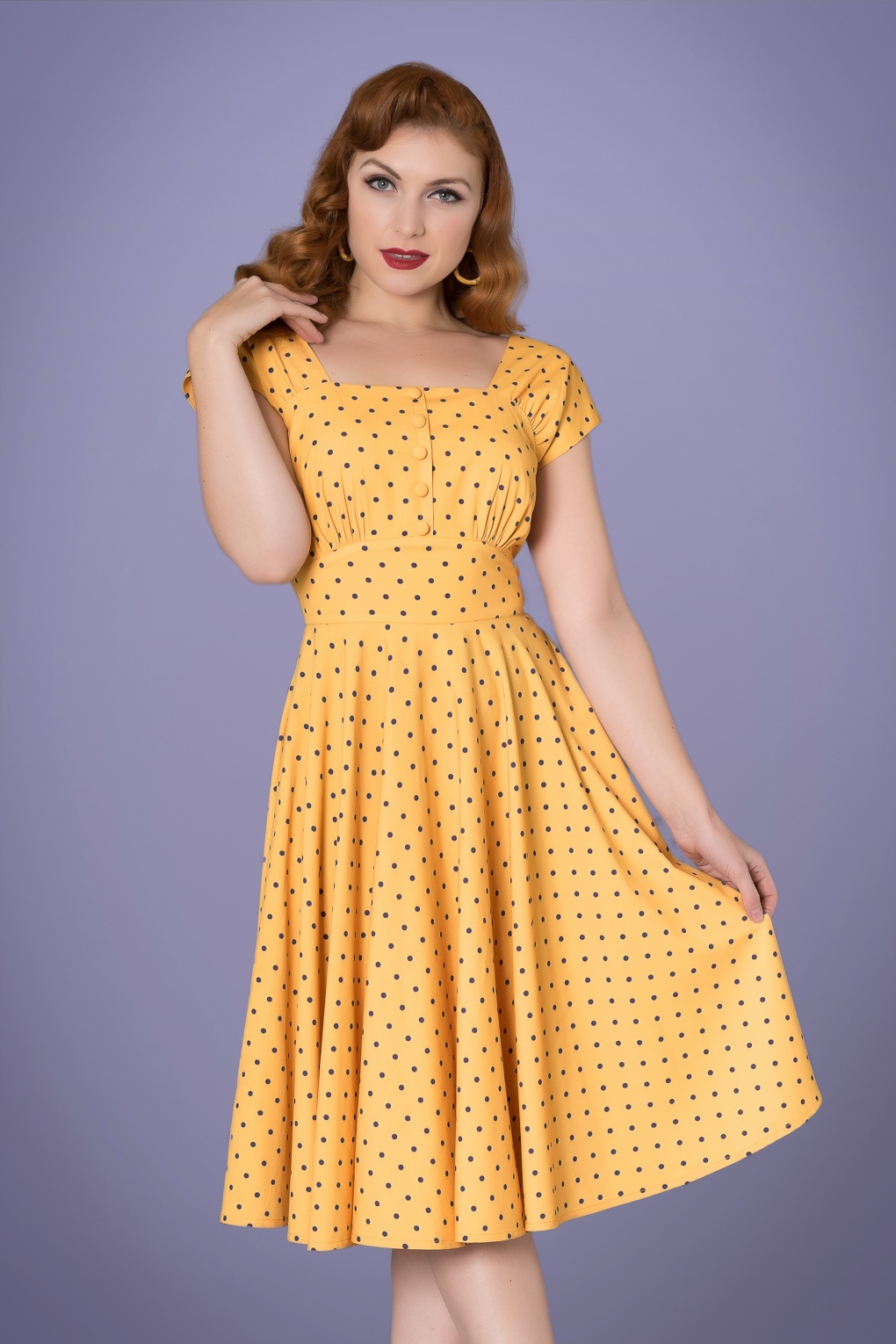 yellow polka dotted dress