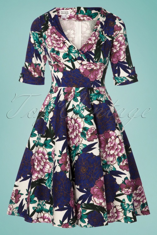 Unique Vintage - Delores Blooming Floral Swing-jurk in wit en blauw