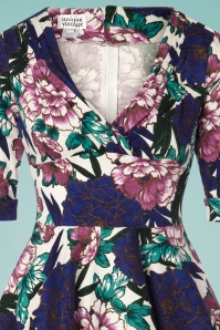 Unique Vintage - Delores Blooming Floral Swing-jurk in wit en blauw 2