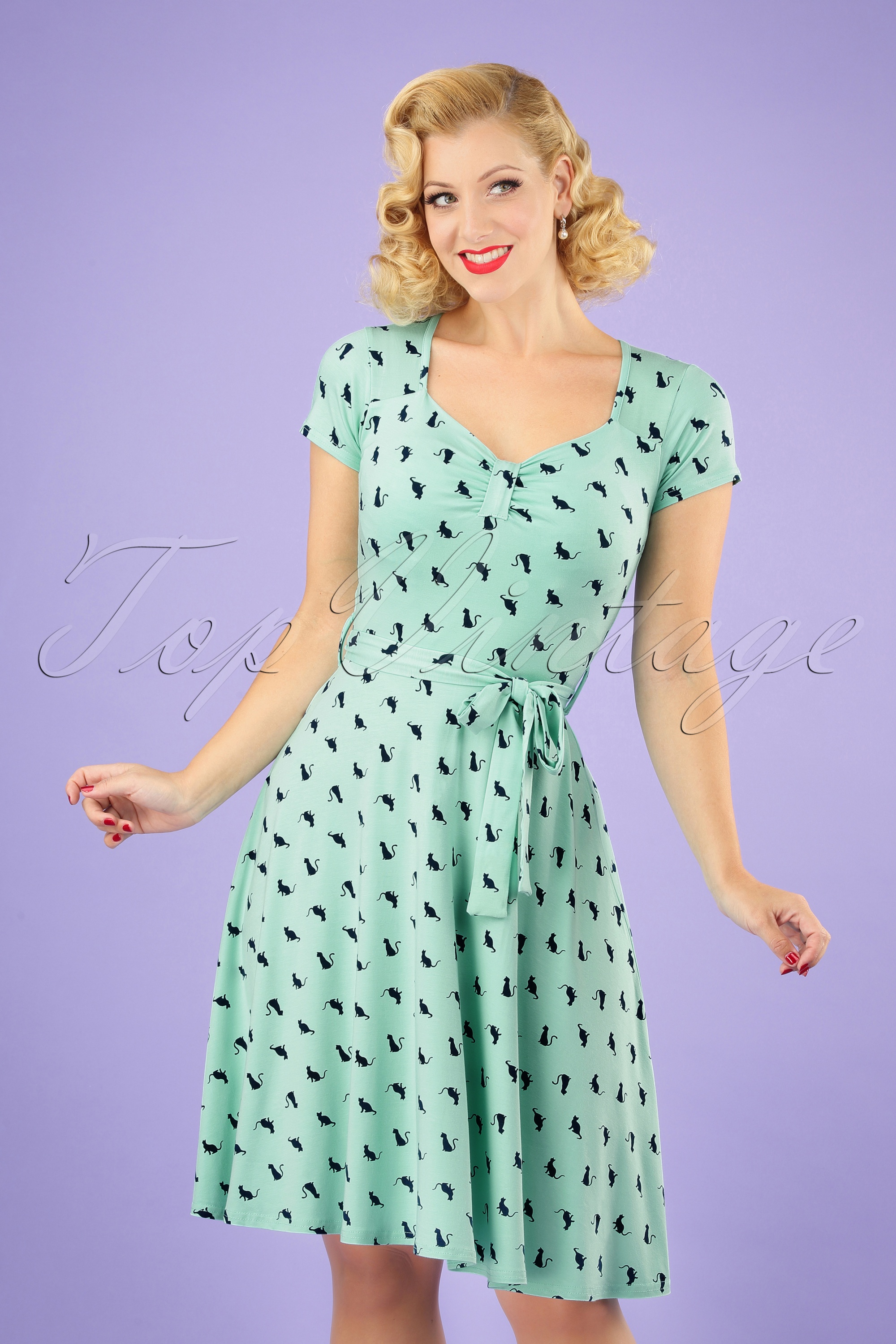 Topvintage Boutique Collection - De Frieda Cat-jurk in mint en marineblauw