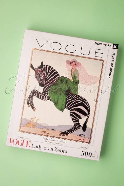 New York Puzzle Company - Lady on a zebra - Vogue puzzel van 500 stukjes