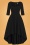Lydia Dip Hem Dress Años 50 en Negro