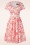 Vintage Diva  - Greta Swing Kleid in Weiß mit rotem Rosenmuster 3