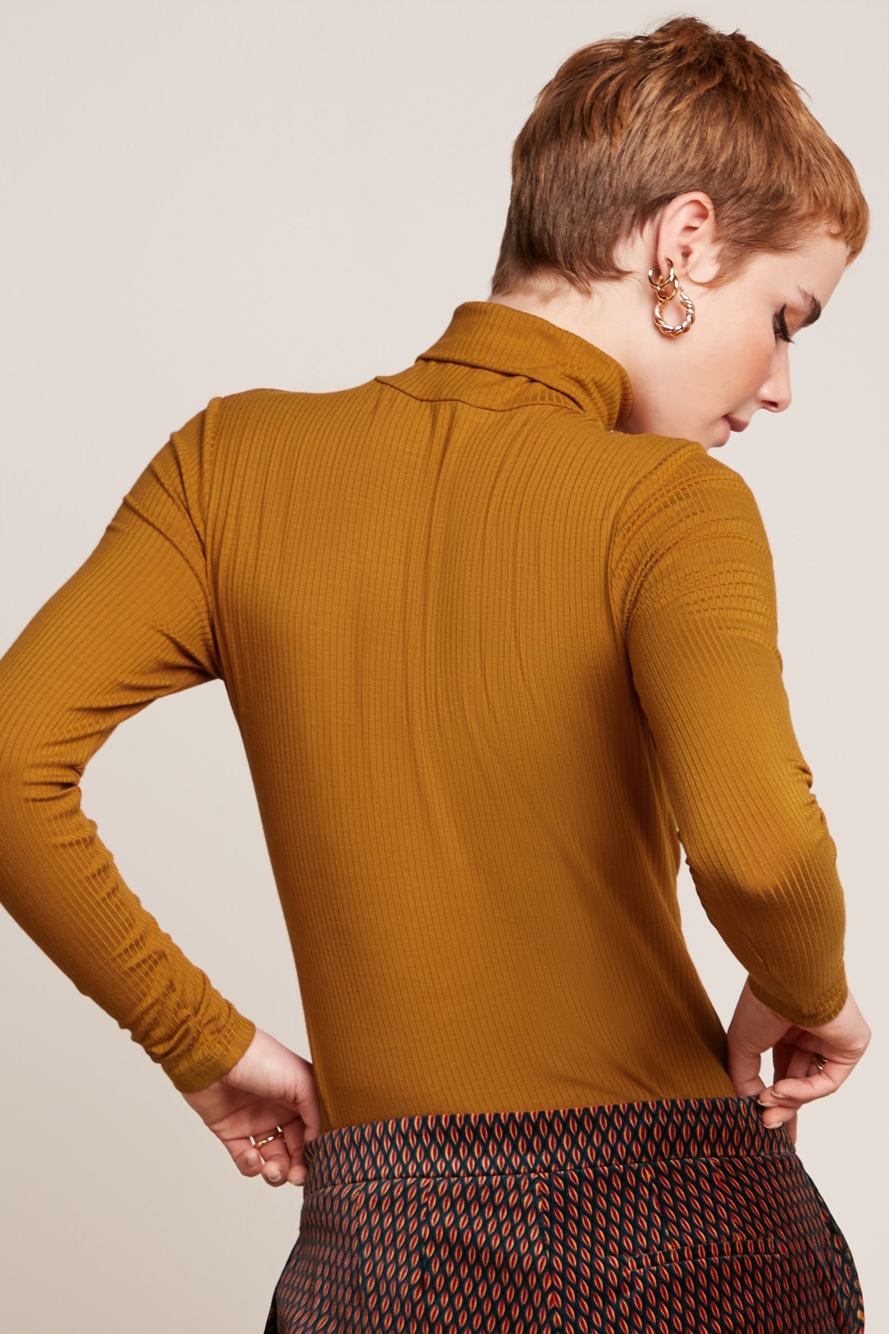 King Louie - Rollneck Uni Rib top in Maple oranje 2