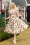 Topvintage Boutique Collection - Bettie Tropical Flower Swing Kleid in Weiß und Multi