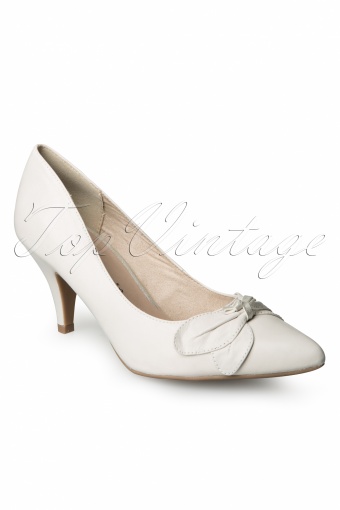 pointed white pumps