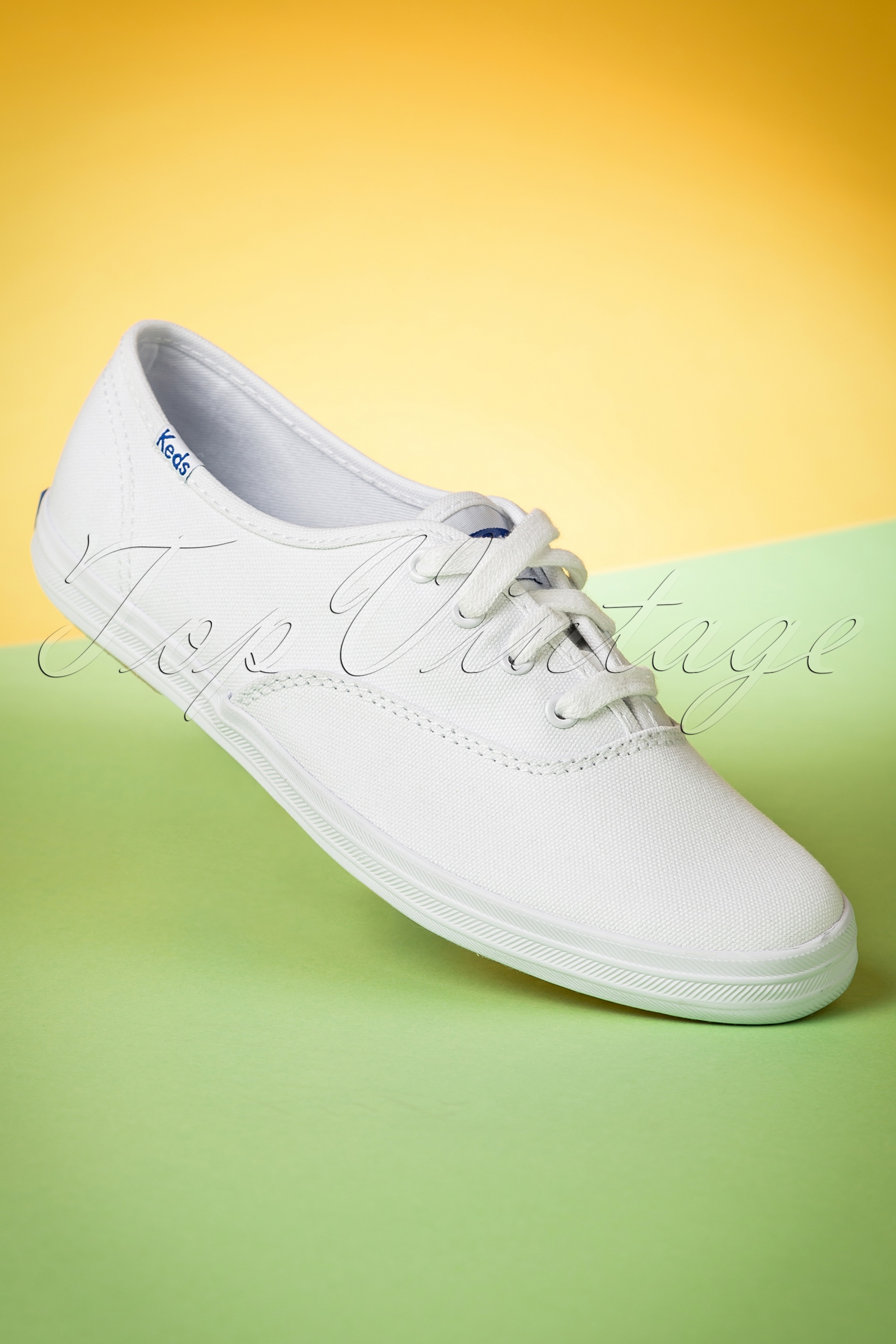 Keds - Champion Core-tekstsneakers in wit