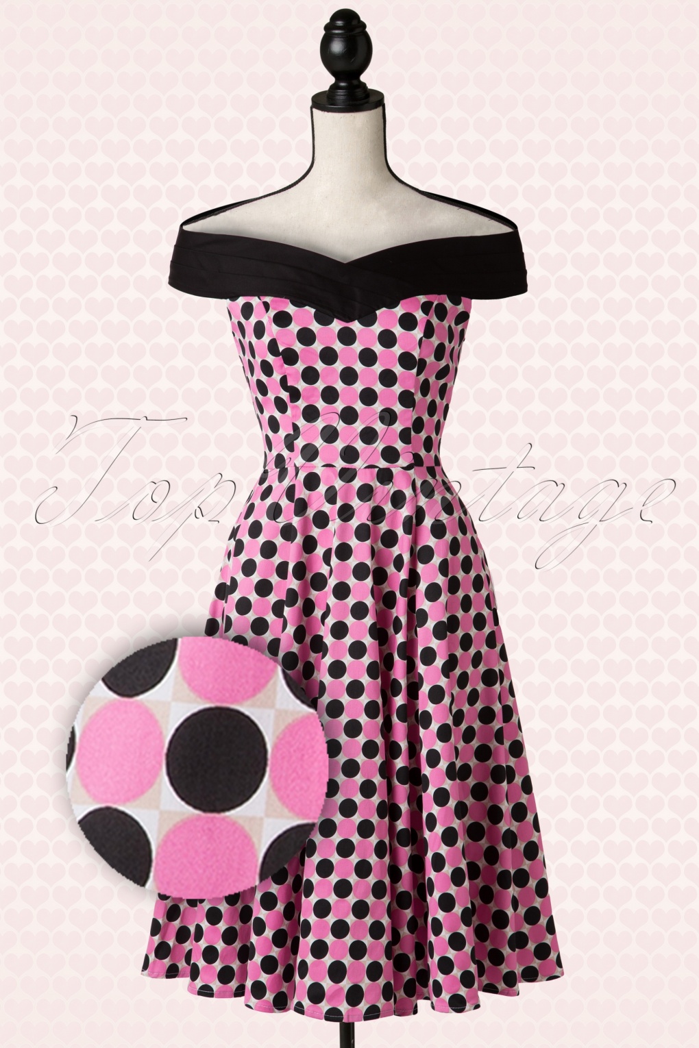 pink and black polka dot dress