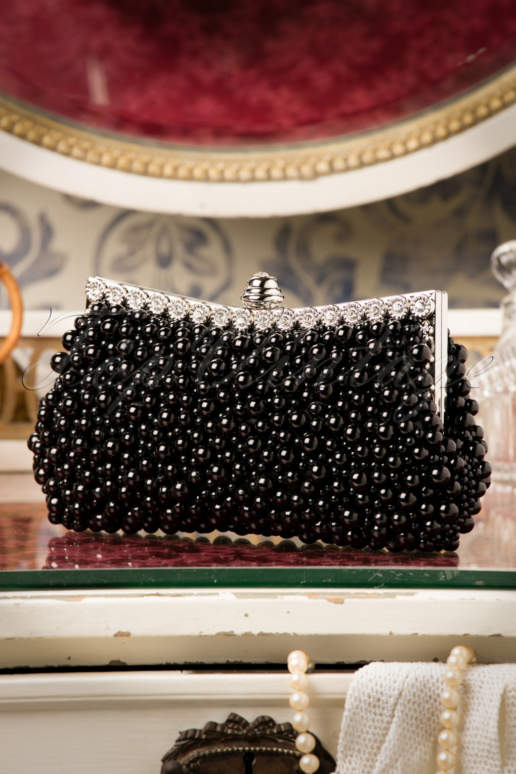 black clutch with pearls